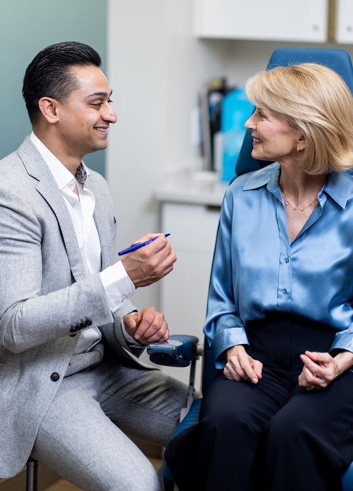Doctor consulting with a patient in a clinic.