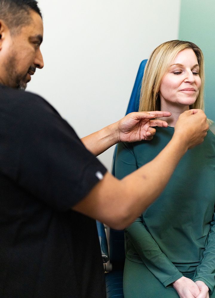 Consultation for aesthetic treatment with patient.