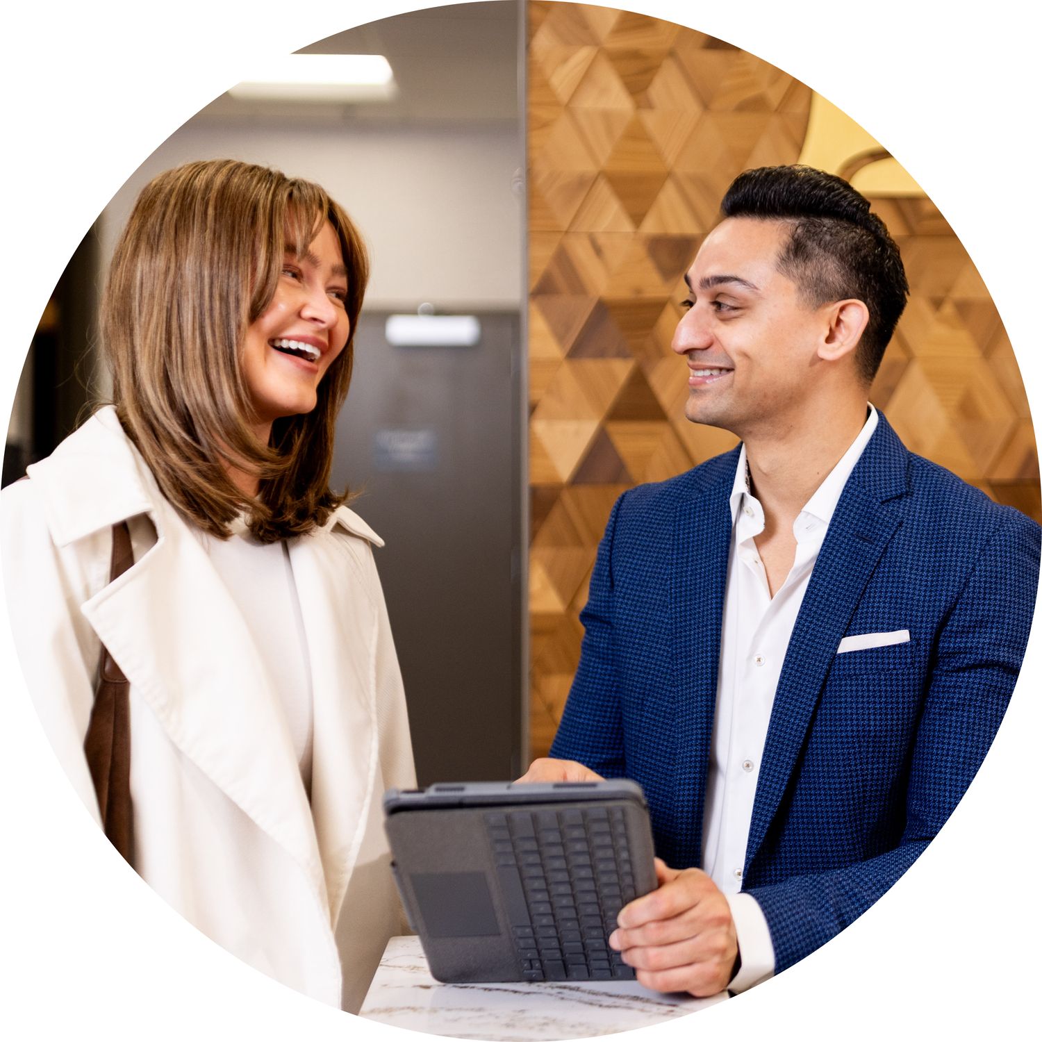 Two professionals engaging in a friendly conversation.